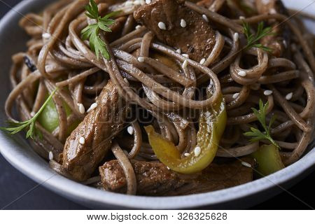Stir-fried Sona With Pork And Vegetables In Asian Style