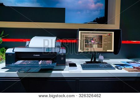 COLOGNE, GERMANY - CIRCA SEPTEMBER, 2018: inkjet printer on display at Canon stand at the Photokina Exhibition.