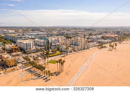 Aerial View Of Santa Monica Pier, California - Usa. Beautiful Amusement Park With Ferris Wheel And R