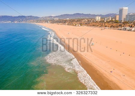 Aerial View Of Santa Monica Pier, California - Usa. Beautiful Amusement Park With Ferris Wheel And R