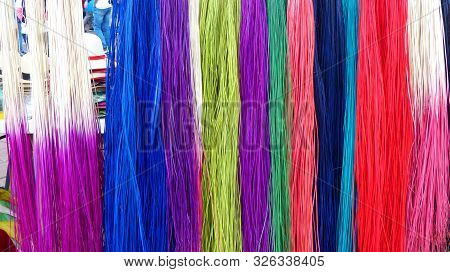 Leaves Of Paja Toquilla Plant Are Separated And Divided Into Thin Fibers, Boiled, Dried, Painted And
