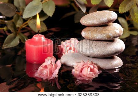 Spa Still Life With Zen Stone, Candle And Plants In Silence Serinity Water. Harmony, Relax And Healt