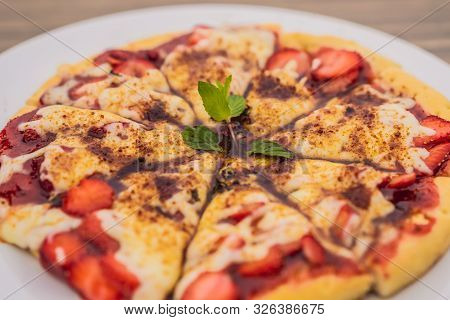 Delicious Strawberry Pizza On A Balinese Tropical Nature Background. Bali Island, Indonesia
