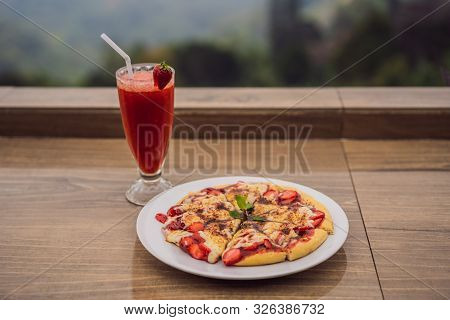 Delicious Strawberry Pizza On A Balinese Tropical Nature Background. Bali Island, Indonesia
