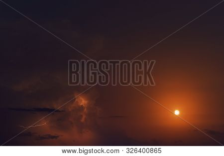 Picturesque Bright Orange Colours Cloudy Sky With Full Moon And Lighting During Mucky Weather, Full 