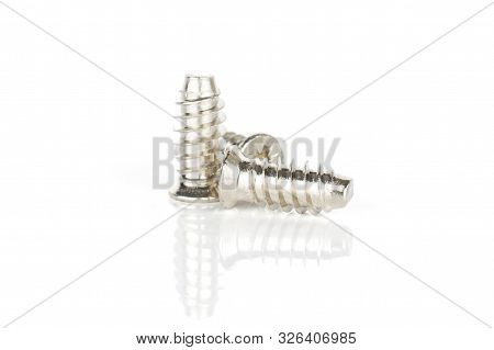 Group Of Three Whole Metallic Glossy Bolt Isolated On White Background