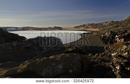 The Winter Colours Of Beautiful Kerio, Or Kerid Crater In Western Iceland. Red Volcanic Rock