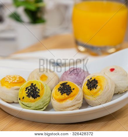 Thai Dessert `mochi ` In Thai Culture And Tea Water Or Fruit Juice