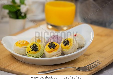 Thai Dessert `mochi ` In Thai Culture And Tea Water Or Fruit Juice.