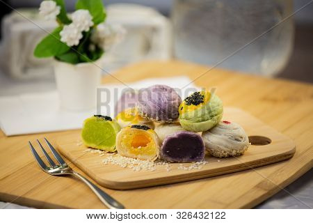 Thai Dessert `mochi ` In Thai Culture And Tea Water Or Fruit Juice