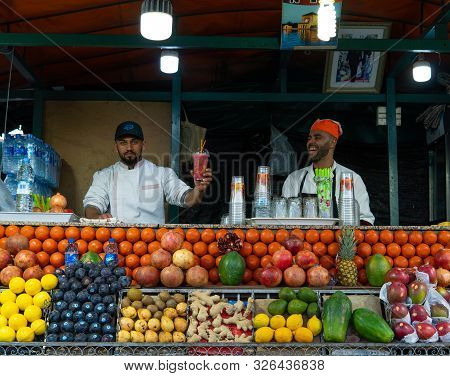 Marrakech, Morocco - 15 Jan 2019: Two Happy Arabic Fruit Fresh Juice Sellers On Jemma El Fna Square 