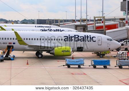 Amsterdam, Netherlands - July 11, 2017: Air Baltic Boeing 737 At Schiphol Airport In Amsterdam. Schi
