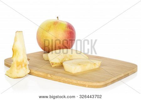 Group Of One Whole Three Slices One Core Of Jonagold Red Apple With Bamboo Plate Isolated On White B