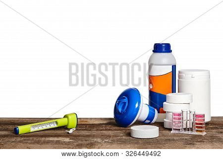 Equipment With Chemical Cleaning Products And Tools For The Maintenance Of The Swimming Pool On A Wo