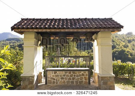 A Small Bell Tower In A Monastery In The Mountains Of Montenegro