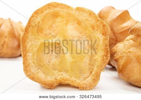 Lot Of Whole One Half Of Baked Golden Profiterole Cross Section Isolated On White Background