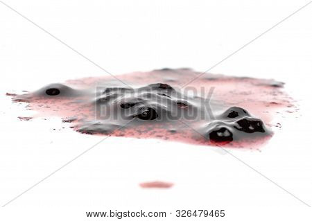 One Piece Of Crushed Fresh Black Blackberry Isolated On White Background