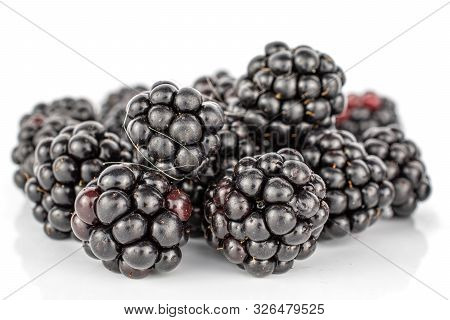 Lot Of Whole Fresh Black Blackberry Stack Isolated On White Background