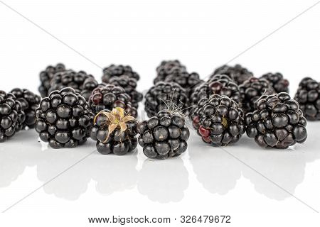 Lot Of Whole Disordered Fresh Black Blackberry Isolated On White Background