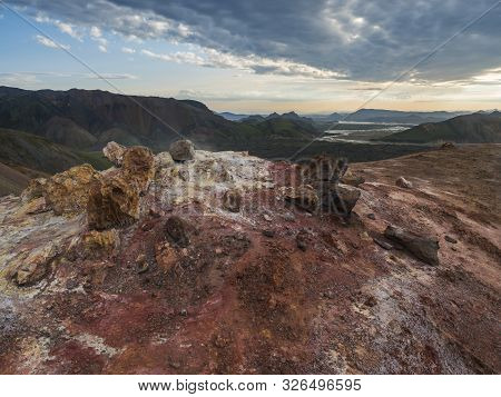Colorful Rhyolit Red And Orange Fumarole At Foot Of Brennisteinsalda Mountain With Panorma Of Landma