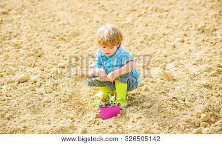 Natural Soil. New Technology In Farming. Earth Day. Summer Farm. Happy Child Gardener. Botanic Worke