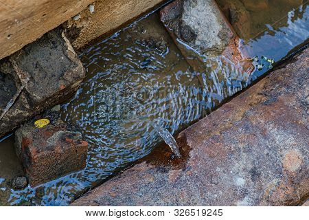 Old Leaky Pipes In The Pit. Preparation For Pipe Replacement.