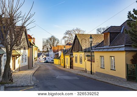 Vienna, Austria - Feb 19, 2019: Idyllic Street Scene In Vienna, Grinzing In Sunset