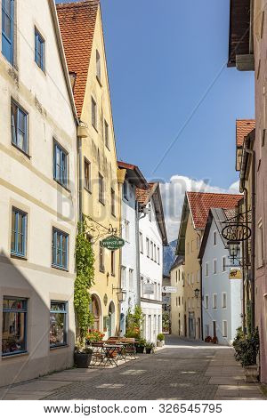 Fuessen, Germany - August 4, 2019: Old Historic Town With Half Timbered Houses And Cobble Stone Road