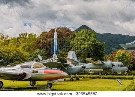 Daejeon, South Korea; October 3, 2019: Military Aircraft And Equipment On Display In Park Like Setti