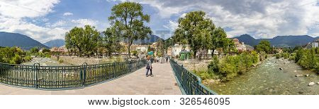 Meran, Italy - August 5, 2019: Bridge Over The Passer River In The Touristic City Of Meran / Merano 