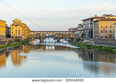 Firenze, Italy - August 13, 2019: Famous Historic Ponte Veccio In Florence At River Arno