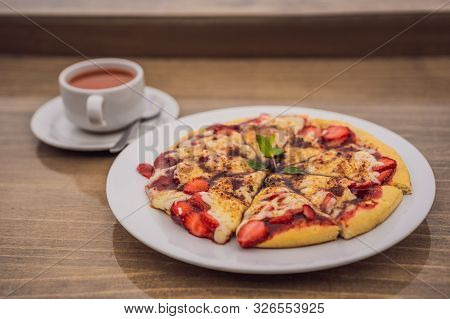 Delicious Strawberry Pizza On A Balinese Tropical Nature Background. Bali Island, Indonesia