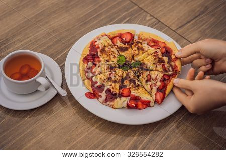 Woman Eating Delicious Strawberry Pizza On A Balinese Tropical Nature Background. Bali Island, Indon