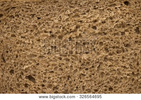 High Resolution Brown Bread Texture Background. Texture Of Brown Bread Baked From Rye Flour
