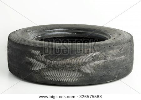 Worn Truck Wheel On White Background. Types Of Wear Wheels.