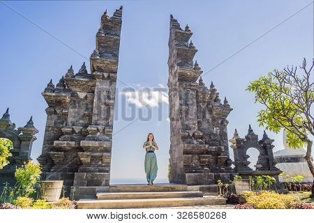 Young Woman Tourist In Budhist Temple Brahma Vihara Arama Banjar Bali, Indonesia