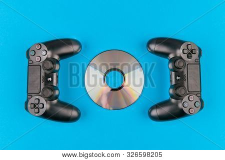 Game Joystick. Playstation. On A Blue Background Top View. The New Sony Dualshock 4 With Playstation