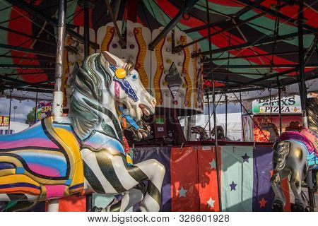 Cheboygan, Michigan, Usa - August 9, 2018: Close Up Of Colorful Carousel Horse On The Merry Go Round