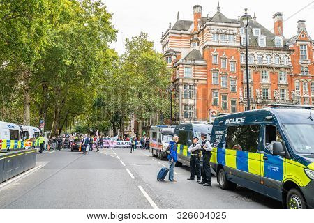 London, Uk - October 7, 2019: London Police. Participants Of The Protest Rally Extinction Rebellion