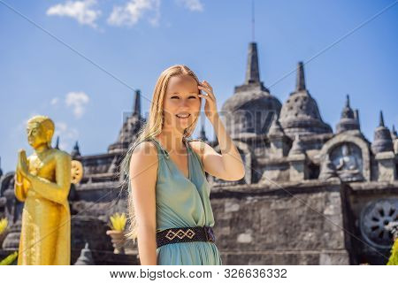 Young Woman Tourist In Budhist Temple Brahma Vihara Arama Banjar Bali, Indonesia