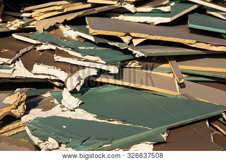 Unusable Sheetrock Laying In A Pile On Dumping Site