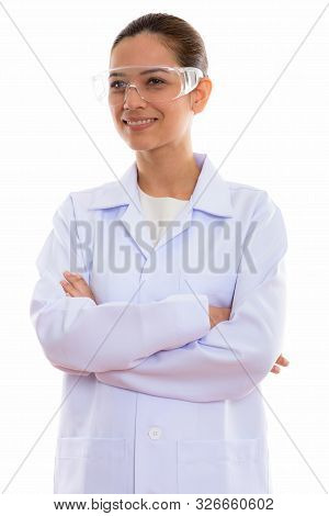 Thoughtful Young Happy Woman Doctor Smiling While Wearing Protec
