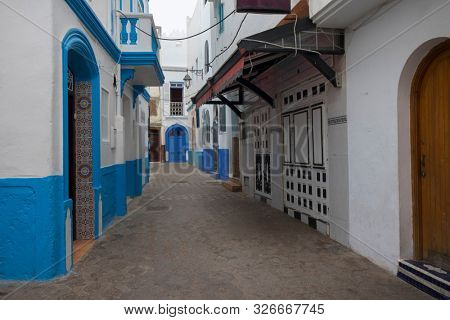 Narrow old street  in the medina of Asilah, Morocco