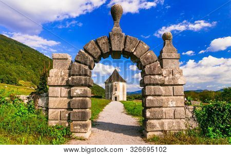 Travel and landmarks of Slovenia - mysterious Devil's Tower, park pavilion in Soteska