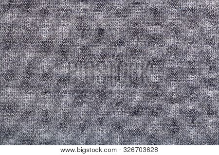 Textile Background - Woven Yarns In Gray Wool Jersey Knitted Fabric Close Up