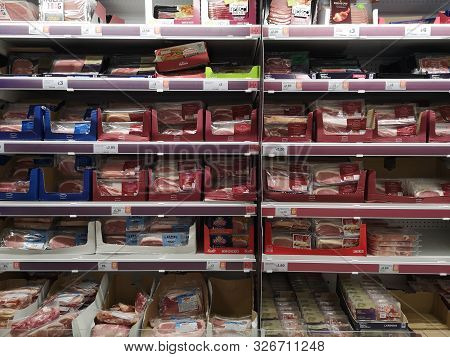 London, Uk - October 7 : Display With Different Types Of Prepacked Meat In A Supermarket On October 