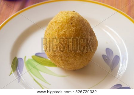 Street Food: Fried Sicilian Arancine In A Dish