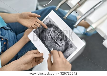 Pretty Womans Teeth Treatment In Dental Clinic