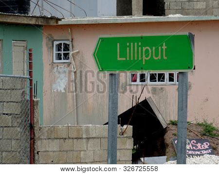 Close Up Picture Of The Sign Of Lilliput Village Near Falmouth In Jamaica