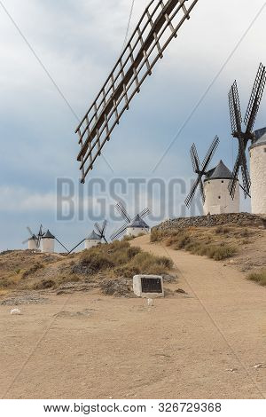 Vertical View Of Old Windmills On Calderico Hill Of The Spanish Municipality Of Consuegra. These Win